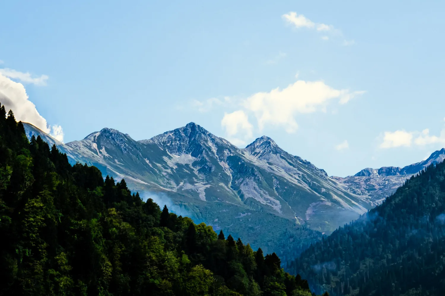 Rocky peaks of the Kaçkar Mountains above forested slopes in Rize province